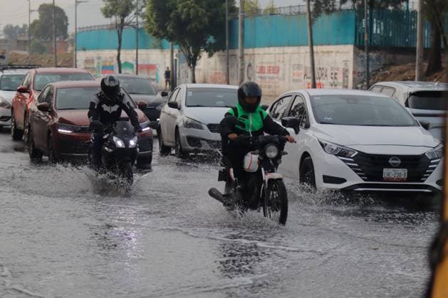 Heavy Rains Hit Mexico Causing Floods Motorcyclists ride on a flooded street near the La Colmena pumping plant, on the border between the State of Mexico and Mexico City after the heavy rains that hit Mexico, affecting several municipalities. on June 3, 2025 in Mexico City, Mexico. (Photo by Carlos Santiago Eyepix Group) Copyright: xCarlosxSantiago xEyepixxGroupx CS_03062025_157523