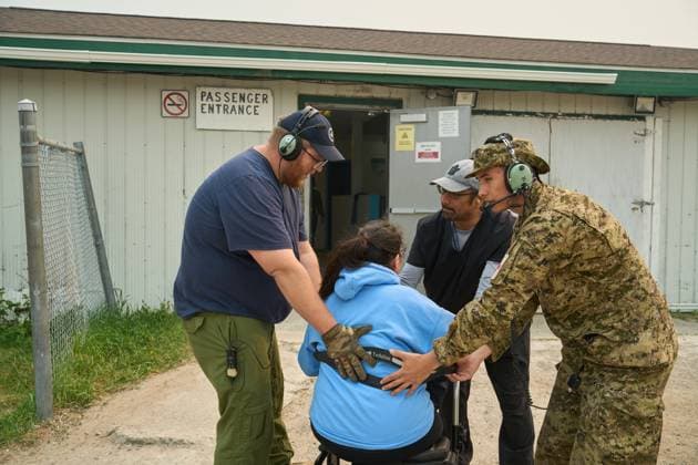 June 3, 2025, Norway House, Mb, CANADA: (L-R) Royal Canadian Air Force Cpl. David Willis, Pinaow Wachi Care Home caregiver Rudy Beardy, and Cpl. Jesse Kewageshig help an evacuee board a C-130 Hercules aircraft in Norway House, Man., Tuesday, June 3, 2025, at the Norway House Airport as crews continue to fight wildfires in northern Manitoba. Norway House CANADA - ZUMAc35_ 20250603_zaf_c35_045 Copyright: xDavidxLipnowskix