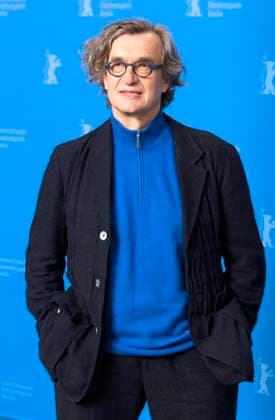 Pina Photocall, 61st Berlin International Film Festival, Berlin WIM WENDERS Pina Photocall, 61st Berlin International Film Festival, Berlin, Germany. February 13th, 2011 half length black jacket blue top glasses hands in pockets CAP PE Peter Eden Berlin Germany Copyright: xPeterxEden CapitalxPicturesx