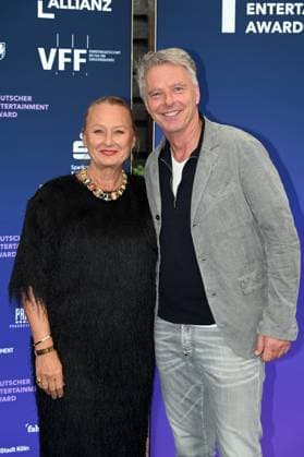 Producer Ute Biernat, CEO UFA Show Factual, and presenter Jörg Pilawa, l r, attend the German Entertainment Award 2025 ceremony