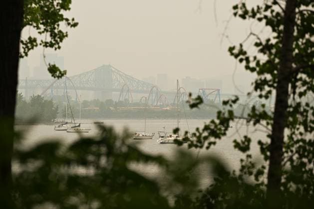 Wildfire Smoke Makes Montreal And Toronto Worst Cities For Air Quality MONTREAL, CANADA - JUNE 6: A view of Montrà al s Jacques Cartier Bridge area obscured by travelling wildfire smoke, in Montreal, Quebec, Canada, on June 6, 2025. As hundreds of wildfires rage across Canada, drifting smoke has triggered emergency evacuations, power outages, and air quality alerts in Ontario, Quà bec, and parts of the U.S., with Montreal ranking as the second most polluted city in the world on June 6, ahead of Delhi and Santiago, and Toronto placing fourth, according to IQAir. Montreal Canada Copyright: xSTRx originalFilename: str-wildfire250606_np743.jpg
