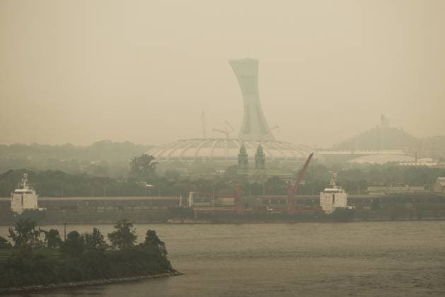 Wildfire Smoke Makes Montreal And Toronto Worst Cities For Air Quality MONTREAL, CANADA - JUNE 6: A view of Montrà al s harbour area with Olympic Stadium in the background, obscured by travelling wildfire smoke, in Montreal, Quebec, Canada, on June 6, 2025. As hundreds of wildfires rage across Canada, drifting smoke has triggered emergency evacuations, power outages, and air quality alerts in Ontario, Quà bec, and parts of the U.S., with Montreal ranking as the second most polluted city in the world on June 6, ahead of Delhi and Santiago, and Toronto placing fourth, according to IQAir. Montreal Canada Copyright: xSTRx originalFilename: str-wildfire250606_npE0o.jpg