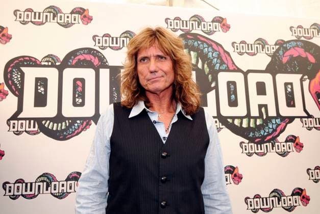 Download Festival 2009 - Day Three WHITESNAKE - DAVID COVERDALE Download Festival 2009 - Day Three Donington Park, Derbyshire, England, Uk, 14th June 2009. concert music gig half length waistcoat shirt long hair black pinstripe blue CAP BRC Ben Rector Donington Derbyshire Great Britain Copyright: xBenxRector CapitalxPicturesx
