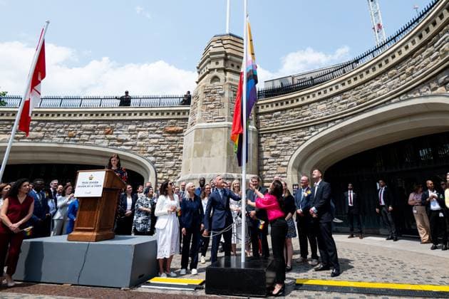 June 10, 2025, Ottawa, On, Canada: Prime Minister Mark Carney, centre-left, takes part in a flag raising ceremony with Minister of Women and Gender Equality and Secretary of State Small Business and Tourism Rechie Valdez marking Pride Month on Parliament Hill in Ottawa, on Tuesday, June 10, 2025. Ottawa Canada  - ZUMAc35_ 20250610_zaf_c35_052 Copyright: xSpencerxColbyx
