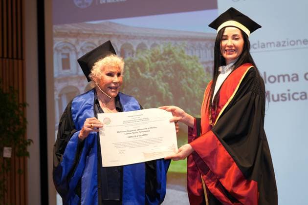 Milan, University of Studies, Awarding of the Honorary Master s Degree in Music, Culture, Media Performance to Ornella Vanoni, pictured with the rector Marina Brambilla  Copyright: xDuilioxPiaggesix xipa-agency.netx xDuilioxPiaggesix IPA_Agency_IPA58927309