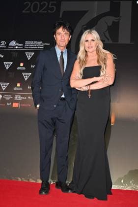 Taormina, 71st Taormina Film Festival 2025 - Day 2, Red Carpet. In the photo: Tiziana Rocca , Giulio base  Copyright: xManuelexMangiarottix xipa-agency.netx xMangiarottix xD avanzox IPA_Agency_IPA58941390