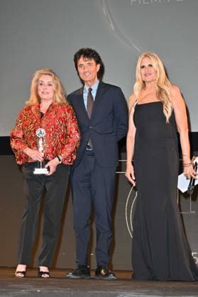 Taormina, 71st Taormina Film Festival 2025 - Day 2, Awards Ceremony. In the photo: Catherine Deneuve, Giulio Base  Copyright: xManuelexMangiarottix xipa-agency.netx xMangiarottix xD avanzox IPA_Agency_IPA58941929