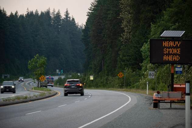 June 11, 2025, Squamish, B.C, CANADA: Signage is placed along Highway 99 advising drivers on road conditions caused by the Dryden Creek wildfire, north of Squamish, B.C., on Wednesday, June 11, 2025. Squamish CANADA  - ZUMAc35_ 20250611_zaf_c35_086 Copyright: xTijanaxMartinx