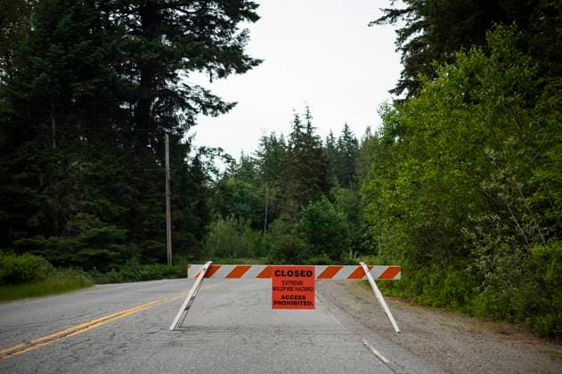June 11, 2025, Squamish, B.C, CANADA: Signage is placed on the road leading to Alice Lake Provincial Park after an evacuation order was issued due to the Dryden Creek wildfire, north of Squamish, B.C., on Wednesday, June 11, 2025. Squamish CANADA  - ZUMAc35_ 20250611_zaf_c35_084 Copyright: xTijanaxMartinx