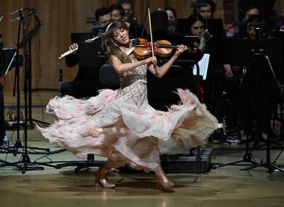 MIAMI, FL - JUNE 13: Lindsey Stirling performs during A Night With the Atlantic Studio Philharmonic Tour at The Adrienne Arsht Knights Center Hall on June 13, 2025 in Miami Florida. Copyright: xmpi04x