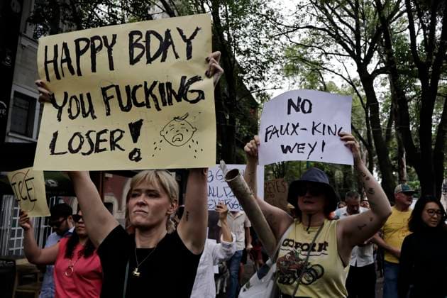 June 14, 2025, Mexico, Cdmx, Mexico: Not only in the Americas are protesting against President Donald Trump, but also abroad, a group of American citizens are taking to the streets of Mexico City toward the United States Embassy to show their disapproval and rejection of the recent violent actions, illegal deportations, and arrests against legal and illegal immigrants in Los Angeles and other sanctuary states. This anti-Trump demonstration is taking place on his birthday, to let him know that he is not a king, that they do not want tyrants, and that they will not celebrate the violence the Trump administration is inflicting on their own people. Mexico Mexico - ZUMAp204 20250614_zip_p204_049 Copyright: xJosuexPerezx