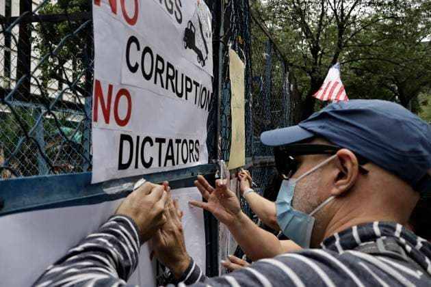 June 14, 2025, Mexico, Cdmx, Mexico: Not only in the Americas are protesting against President Donald Trump, but also abroad, a group of American citizens are taking to the streets of Mexico City toward the United States Embassy to show their disapproval and rejection of the recent violent actions, illegal deportations, and arrests against legal and illegal immigrants in Los Angeles and other sanctuary states. This anti-Trump demonstration is taking place on his birthday, to let him know that he is not a king, that they do not want tyrants, and that they will not celebrate the violence the Trump administration is inflicting on their own people. Mexico Mexico - ZUMAp204 20250614_zip_p204_027 Copyright: xJosuexPerezx