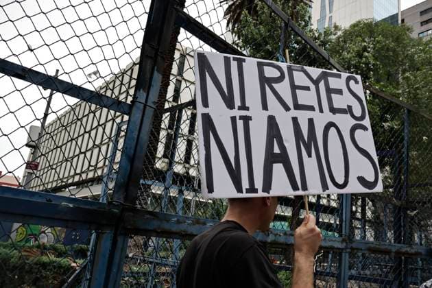 June 14, 2025, Mexico, Cdmx, Mexico: Not only in the Americas are protesting against President Donald Trump, but also abroad, a group of American citizens are taking to the streets of Mexico City toward the United States Embassy to show their disapproval and rejection of the recent violent actions, illegal deportations, and arrests against legal and illegal immigrants in Los Angeles and other sanctuary states. This anti-Trump demonstration is taking place on his birthday, to let him know that he is not a king, that they do not want tyrants, and that they will not celebrate the violence the Trump administration is inflicting on their own people. Mexico Mexico - ZUMAp204 20250614_zip_p204_034 Copyright: xJosuexPerezx