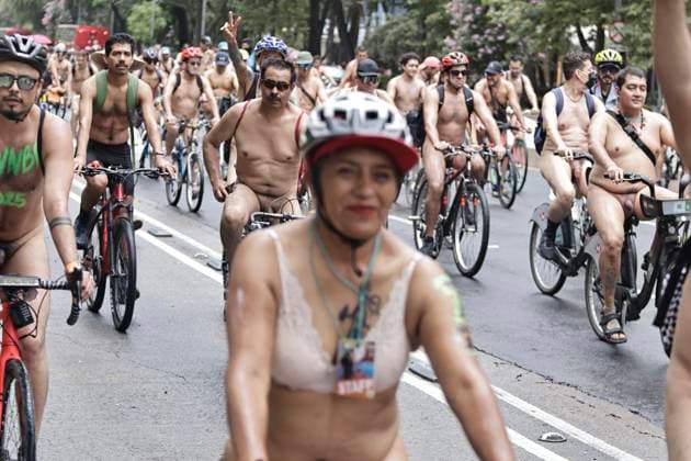 June 14, 2025, Mexico, Cdmx, Mexico: A group of cycling enthusiasts went out for a Nude Ride despite the rain in the city. They rode along Paseo de la Reforma Avenue, showing off their naked, rain-soaked bodies to passersby and tourists. Mexico Mexico - ZUMAp204 20250614_zip_p204_082 Copyright: xJosuexPerezx