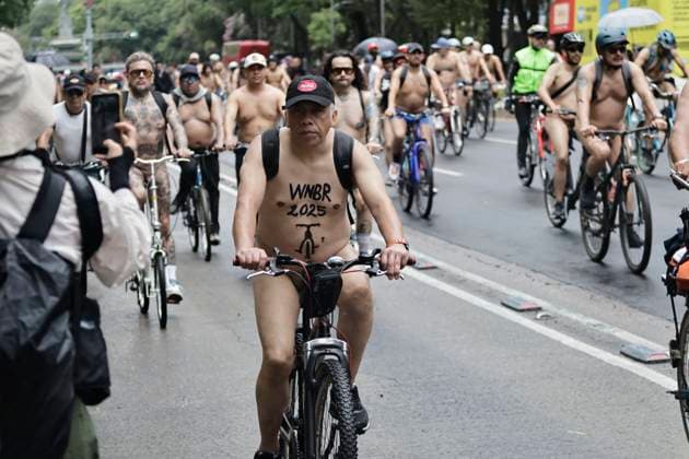 June 14, 2025, Mexico, Cdmx, Mexico: A group of cycling enthusiasts went out for a Nude Ride despite the rain in the city. They rode along Paseo de la Reforma Avenue, showing off their naked, rain-soaked bodies to passersby and tourists. Mexico Mexico - ZUMAp204 20250614_zip_p204_072 Copyright: xJosuexPerezx