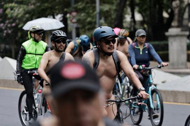 June 14, 2025, Mexico, Cdmx, Mexico: A group of cycling enthusiasts went out for a Nude Ride despite the rain in the city. They rode along Paseo de la Reforma Avenue, showing off their naked, rain-soaked bodies to passersby and tourists. Mexico Mexico - ZUMAp204 20250614_zip_p204_071 Copyright: xJosuexPerezx