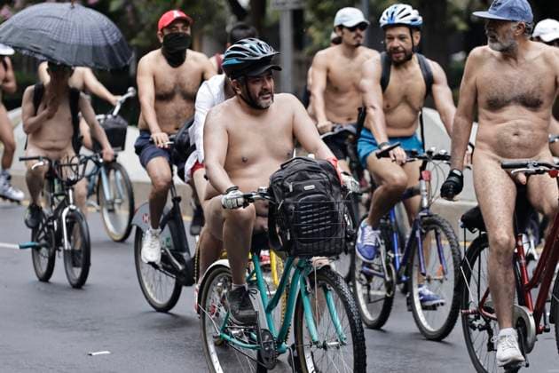 June 14, 2025, Mexico, Cdmx, Mexico: A group of cycling enthusiasts went out for a Nude Ride despite the rain in the city. They rode along Paseo de la Reforma Avenue, showing off their naked, rain-soaked bodies to passersby and tourists. Mexico Mexico - ZUMAp204 20250614_zip_p204_069 Copyright: xJosuexPerezx