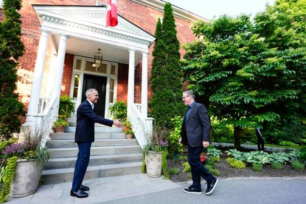 June 14, 2025, Ottawa, On, CANADA: Prime Minister Mark Carney greets Prime Minister of the United Kingdom Kier Starmer, outside his residence at Rideau Cottage in Ottawa, before the G7 Summit in Kananaskis, Alta., on Saturday, June 14, 2025. Ottawa CANADA - ZUMAc35_ 20250614_zaf_c35_204 Copyright: xJustinxTangx