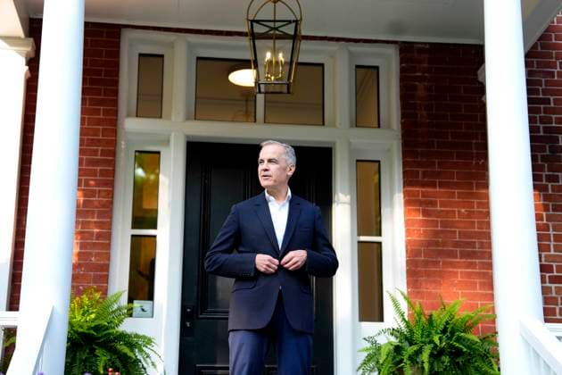 June 14, 2025, Ottawa, On, CANADA: Prime Minister Mark Carney buttons his suit jacket as he waits to greet Prime Minister of the United Kingdom Kier Starmer, not shown, at his residence at Rideau Cottage in Ottawa, on Saturday, June 14, 2025. Ottawa CANADA  - ZUMAc35_ 20250614_zaf_c35_206 Copyright: xJustinxTangx