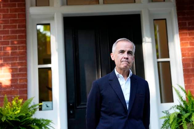 June 14, 2025, Ottawa, On, CANADA: Prime Minister Mark Carney waits to greet Prime Minister of the United Kingdom Kier Starmer, not shown, at his residence at Rideau Cottage in Ottawa, on Saturday, June 14, 2025. Ottawa CANADA  - ZUMAc35_ 20250614_zaf_c35_208 Copyright: xJustinxTangx