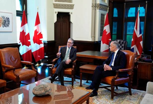 June 15, 2025, Ottawa, On, CAN: Prime Minister of Canada Mark Carney, right, meets with Prime Minister of the United Kingdom Keir Starmer in his office on Parliament Hill in Ottawa, on Sunday, June 15, 2025. Ottawa CAN  - ZUMAc35_ 20250615_zaf_c35_005 Copyright: xJustinxTangx