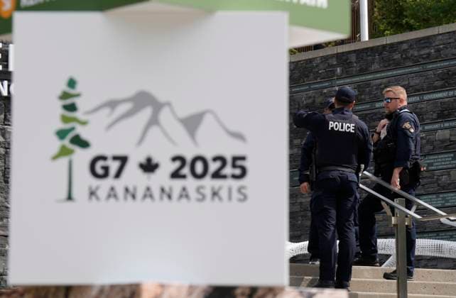 June 15, 2025, Banff, Ab, Canada: RCMP members are seen outside the media centre for the G7 Summit on Sunday, June 15, 2025 in Banff, Alberta. Banff Canada  - ZUMAc35_ 20250615_zaf_c35_029 Copyright: xAdrianxWyldx