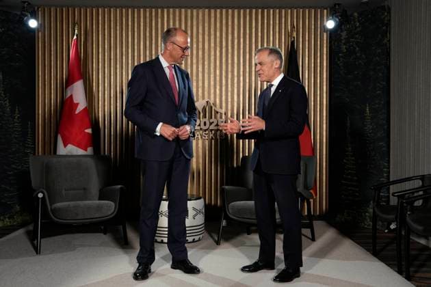 June 15, 2025, Kananaskis, Ab, Canada: Prime Minister Mark Carney meets with German Chancellor Friedrich Merz ahead of the G7 Summit at the Pomeroy Kananaskis Mountain Lodge, approximately 100km west of Calgary, in Kananaskis, Alta., Sunday, June 15, 2025. Kananaskis Canada - ZUMAc35_ 20250615_zaf_c35_224 Copyright: xAdrianxWyldx