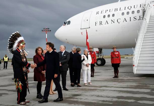 June 15, 2025, Calgary, Ab, CANADA: French President Emmanuel Macron, third right, is greeted by Steven Crowchild, of the Tsuut ina First Nation as he arrives in Calgary, Alta., Sunday, June 15, 2025, to attend the G7 Leaders meeting taking place in the nearby community of Kananaskis. Calgary CANADA - ZUMAc35_ 20250615_zaf_c35_229 Copyright: xJeffxMcintoshx