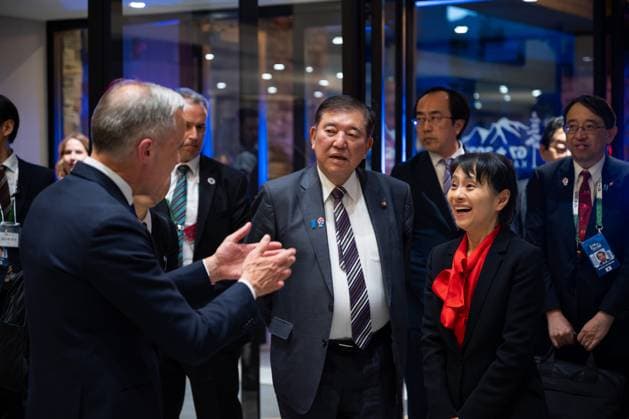 Japan s Prime Minister Shigeru Ishiba and his wife Yoshiko Ishiba are welcomed by Canadian Prime Minister Mark Carney upon their arrival in Kananaskis, Alberta, Canada, on Monday, June 16, 2025, for the G7 Summit, which is being held from June 15 to 17. Photo via G7  WAX2025061608 G7