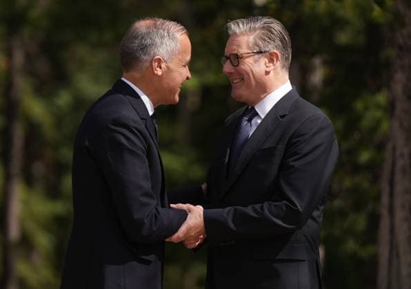 June 16, 2025, Kananaskis, Ab, CANADA: Canadian Prime Minister Mark Carney, left, welcomes British Prime Minister Keir Starmer to the G7 Summit in Kananaskis, Alta., on Monday, June 16, 2025. Kananaskis CANADA - ZUMAc35_ 20250616_zaf_c35_085 Copyright: xDarrylxDyckx