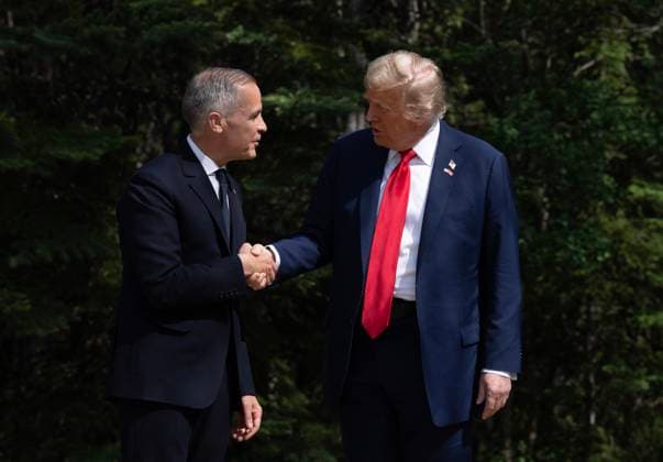 June 16, 2025, Kananaskis, Ab, Canada: Prime Minister Mark Carney speaks with United States President Donald Trump during an official welcome ceremony at the G7 Summit in Kananaskis, Alta., on Monday, June 16, 2025. Kananaskis Canada  - ZUMAc35_ 20250616_zaf_c35_059 Copyright: xAdrianxWyldx