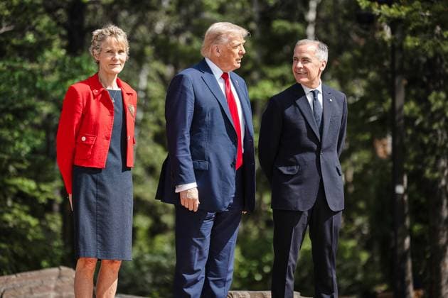 Kananaskis, Alberta, Canada, 16 06 2025 Mountain Lodge G7 Summit 2025 L R Diana Fox Carney, US President Donald Trump and Canadian Prime Minister Mark Carney Copyright: xGovernmentxofxCanada dtsxNachrichtenagenturx dts_71146