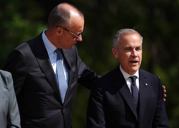 June 16, 2025, Kananaskis, Ab, CANADA: Canadian Prime Minister Mark Carney, right, and German Chancellor Friedrich Merz pose for photos after Carney welcomed him to the G7 Summit in Kananaskis, Alta., on Monday, June 16, 2025. Kananaskis CANADA - ZUMAc35_ 20250616_zaf_c35_168 Copyright: xDarrylxDyckx