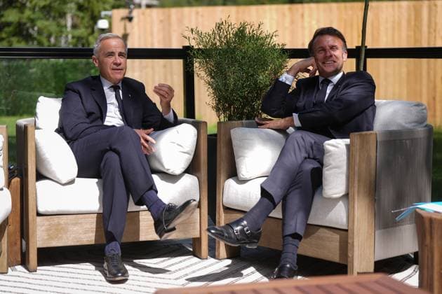 June 16, 2025, Kananaskis, Ab, CANADA: Prime Minister Mark Carney, left, and French President Emmanuel Macron hold a meeting on a patio during the G7 Summit in Kananaskis, Alta., on Monday, June 16, 2025. Kananaskis CANADA - ZUMAc35_ 20250616_zaf_c35_213 Copyright: xDarrylxDyckx