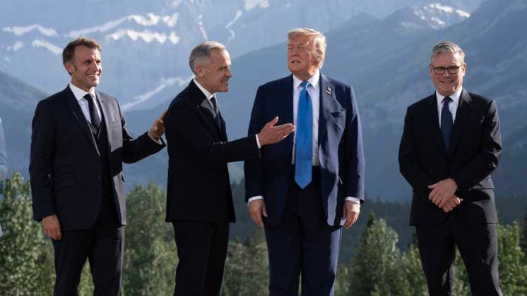 June 16, 2025, Kananaskis, Ab, Canada: Prime Minister Mark Carney tries to usher United States President Donald Trump off the stage along with French President Emmanuel Macron(left) and United Kingdom Prime Minister Keir Starmer(right) following the family photo at the G7 Summit, in Kananaskis, Alta., Monday, June 16, 2025. Kananaskis Canada  - ZUMAc35_ 20250616_zaf_c35_227 Copyright: xAdrianxWyldx