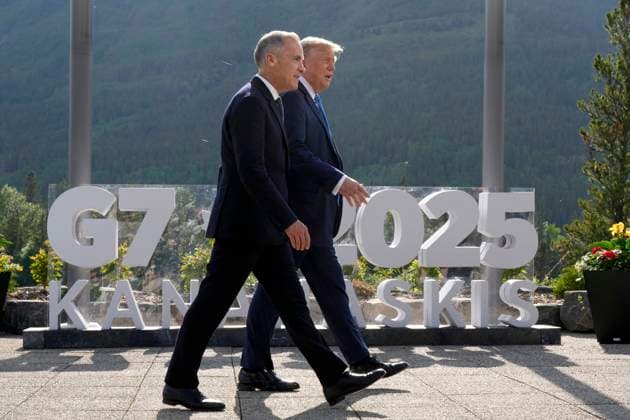 June 16, 2025, Kananaskis, Ab, CANADA: Prime Minister Mark Carney walks with U.S. President Donald Trump before the family photograph during the G7 Summit in Kananaskis, Alta., Monday, June 16, 2025. Kananaskis CANADA  - ZUMAc35_ 20250616_zaf_c35_258 Copyright: xAdrianxWyldx