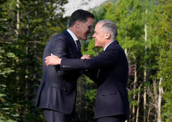 June 17, 2025, Kananaskis, Ab, Canada: Prime Minister Mark Carney greets North Atlantic Treaty Organization Secretary General Mark Rutte at the G7 Summit in Kananaskis, Alta., on Tuesday, June 17, 2025. Kananaskis Canada  - ZUMAc35_ 20250617_zaf_c35_031 Copyright: xAdrianxWyldx