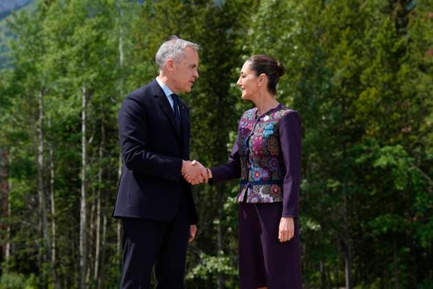 June 17, 2025, Kananaskis, Ab, Canada: Prime Minister Mark Carney greets Mexican President Claudia Sheinbaum at the G7 Summit in Kananaskis, Alta., on Tuesday, June 17, 2025. Kananaskis Canada  - ZUMAc35_ 20250617_zaf_c35_139 Copyright: xAdrianxWyldx