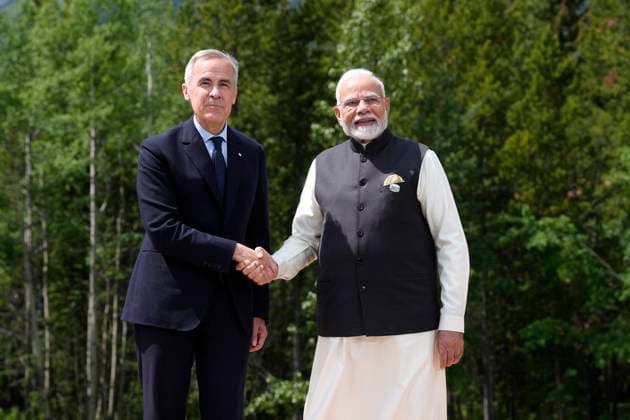 June 17, 2025, Kananaskis, Ab, Canada: Prime Minister Mark Carney greets Indian Prime Minister Narendra Modi at the G7 Summit in Kananaskis, Alta., on Tuesday, June 17, 2025. Kananaskis Canada  - ZUMAc35_ 20250617_zaf_c35_142 Copyright: xAdrianxWyldx