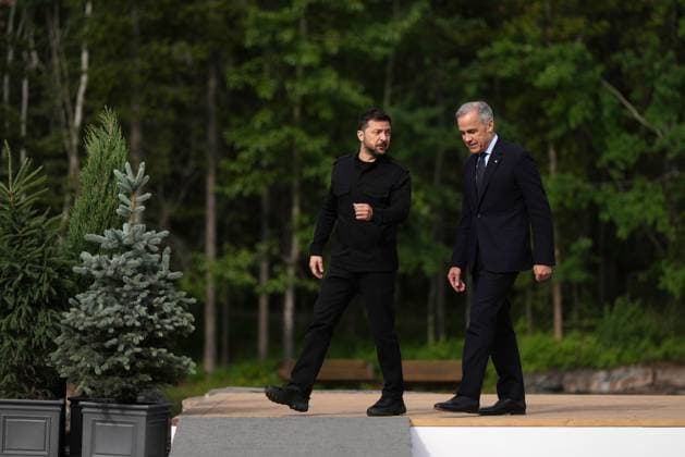 June 17, 2025, Kananaskis, Ab, CANADA: Canadian Prime Minister Mark Carney, right, welcomes Ukrainian President Volodymyr Zelenskyy to the G7 Summit in Kananaskis, Alta., on Tuesday, June 17, 2025. Kananaskis CANADA - ZUMAc35_ 20250617_zaf_c35_078 Copyright: xDarrylxDyckx