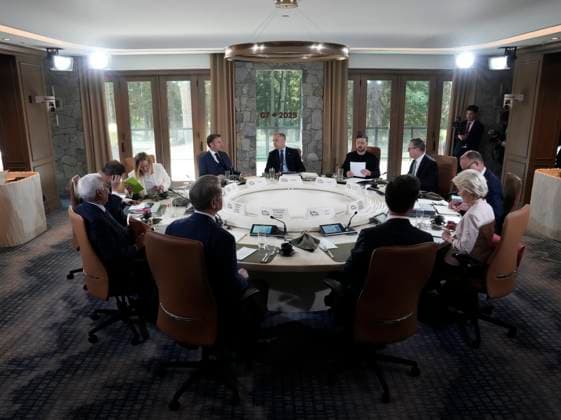 June 17, 2025, Kananaskis, Ab, Canada: Prime Minister Mark Carney speaks with French President Emmanuel Macron before a session with Ukrainian President Volodymyr Zelenskyy at the G7 Summit in Kananaskis, Alta., on Tuesday, June 17, 2025. Kananaskis Canada  - ZUMAc35_ 20250617_zaf_c35_094 Copyright: xAdrianxWyldx