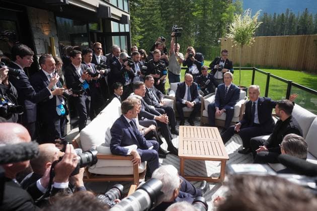 June 17, 2025, Kananaskis, Ab, CANADA: Canadian Prime Minister Mark Carney, back second right, sits with Ukrainian President Volodymyr Zelenskyy, right, and other leaders and invited guests as they gather on a patio before a working session during the G7 Summit in Kananaskis, Alta., on Tuesday, June 17, 2025. Kananaskis CANADA - ZUMAc35_ 20250617_zaf_c35_097 Copyright: xDarrylxDyckx