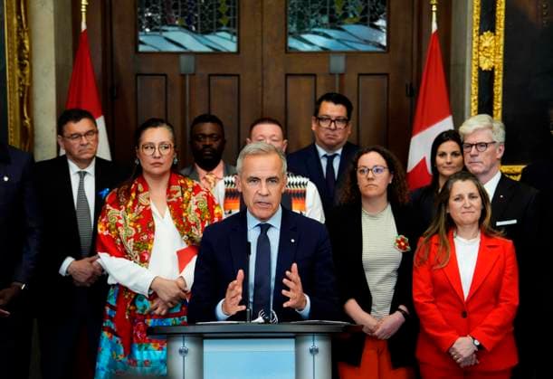 June 20, 2025, Ottawa, On, CAN: Prime Minister Mark Carney is joined by members of his cabinet and caucus as he speaks at a news conference in the Foyer of the House of Commons in Ottawa, after Bill C-5 passed in the House, on Friday, June 20, 2025. Ottawa CAN  - ZUMAc35_ 20250620_zaf_c35_041 Copyright: xJustinxTangx