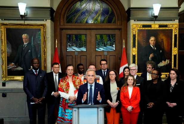 June 20, 2025, Ottawa, On, CAN: Prime Minister Mark Carney is joined by members of his cabinet and caucus as he speaks at a news conference in the Foyer of the House of Commons in Ottawa, after Bill C-5 passed in the House, on Friday, June 20, 2025. Ottawa CAN  - ZUMAc35_ 20250620_zaf_c35_044 Copyright: xJustinxTangx