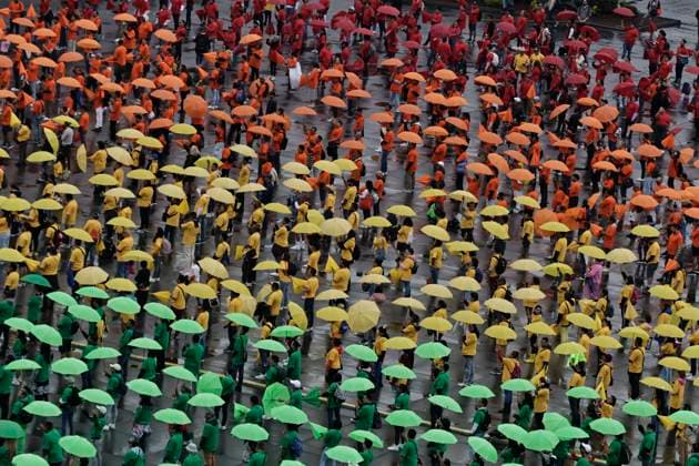 June 22, 2025, Mexico, Cdmx, Mexico: Hundreds of people gathered in Mexico City s Plaza de la ConstitucioÂ³n to break the record for the world s largest LGBTTTIQA+ flag. For this event, they used umbrellas in the same colors as the gay community flag. Mexico Mexico - ZUMAp204 20250622_zip_p204_003 Copyright: xJosuexPerezx