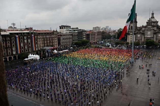 June 22, 2025, Mexico, Cdmx, Mexico: Hundreds of people gathered in Mexico City s Plaza de la ConstitucioÂ³n to break the record for the world s largest LGBTTTIQA+ flag. For this event, they used umbrellas in the same colors as the gay community flag. Mexico Mexico - ZUMAp204 20250622_zip_p204_006 Copyright: xJosuexPerezx