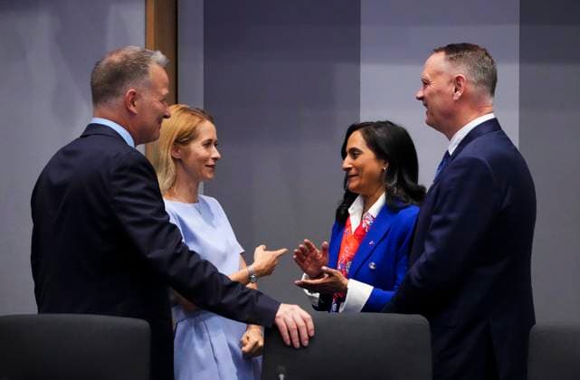 June 23, 2025, Brussels, Belgium: Canadian Minister of Foreign Affairs Anita Anand, second from right, Canadian Minister of National Defence David McGuinty, right, and Canadian Secretary of State (Defence Procurement) Stephen Fuhr, left, speak with European Union foreign policy chief Kaja Kallas as they wait for the start of a plenary at the Canada EU Summit in Brussels, Belgium on Monday, June 23, 2025. Brussels Belgium - ZUMAc35_ 20250623_zaf_c35_052 Copyright: xSeanxKilpatrickx