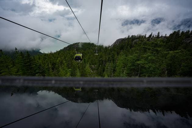 June 26, 2025, Squamish, Bc, CANADA: A Sea-to-Sky Gondola car carries people up a forest-covered mountain ridge in Squamish, B.C., on Thursday, June 26, 2025. The Squamish Nation and the provincial government have signed an agreement to guide forest stewardship in the nation s territory to protect cultural sites and environmentally sensitive areas from logging, new roads and tenures. The agreement establishes 33 cultural sites and six special cultural management areas. Squamish CANADA  - ZUMAc35_ 20250626_zaf_c35_025 Copyright: xDarrylxDyckx