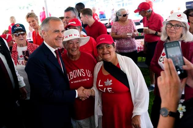 July 1, 2025, Ottawa, On, CANADA: Prime Minister Mark Carney greets people attending the Seniors and Families Breakfast at the Canada Day in Barrhaven celebration in Ottawa on Tuesday, July 1, 2025. Ottawa CANADA  - ZUMAc35_ 20250701_zaf_c35_006 Copyright: xJustinxTangx