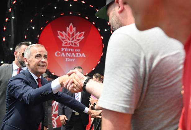 July 1, 2025, Ottawa, On, Canada: Prime Minister Mark Carney greets members of the public during Canada Day celebrations at LeBreton Flats in Ottawa on Tuesday, July 1, 2025. Ottawa Canada  - ZUMAc35_ 20250701_zaf_c35_017 Copyright: xSpencerxColbyx